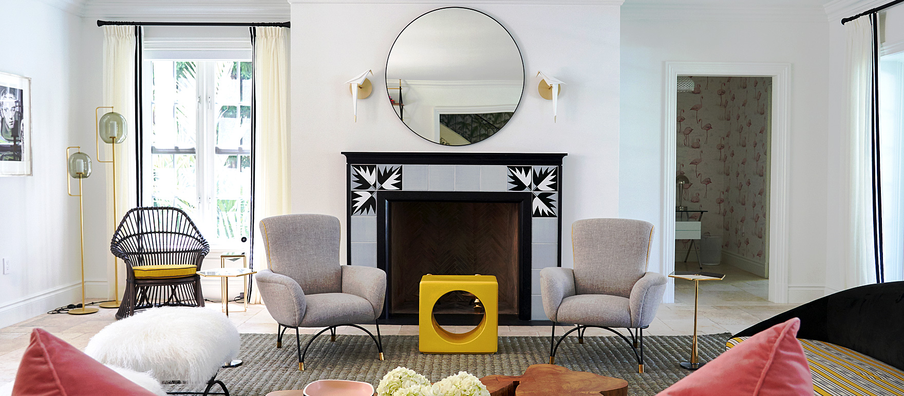 Contemporary Window Drapery rods with Upholstered Armchairs.